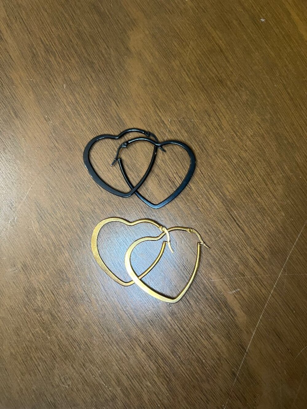 Two Pairs of Heart-Shaped Hoops, Black and Gold